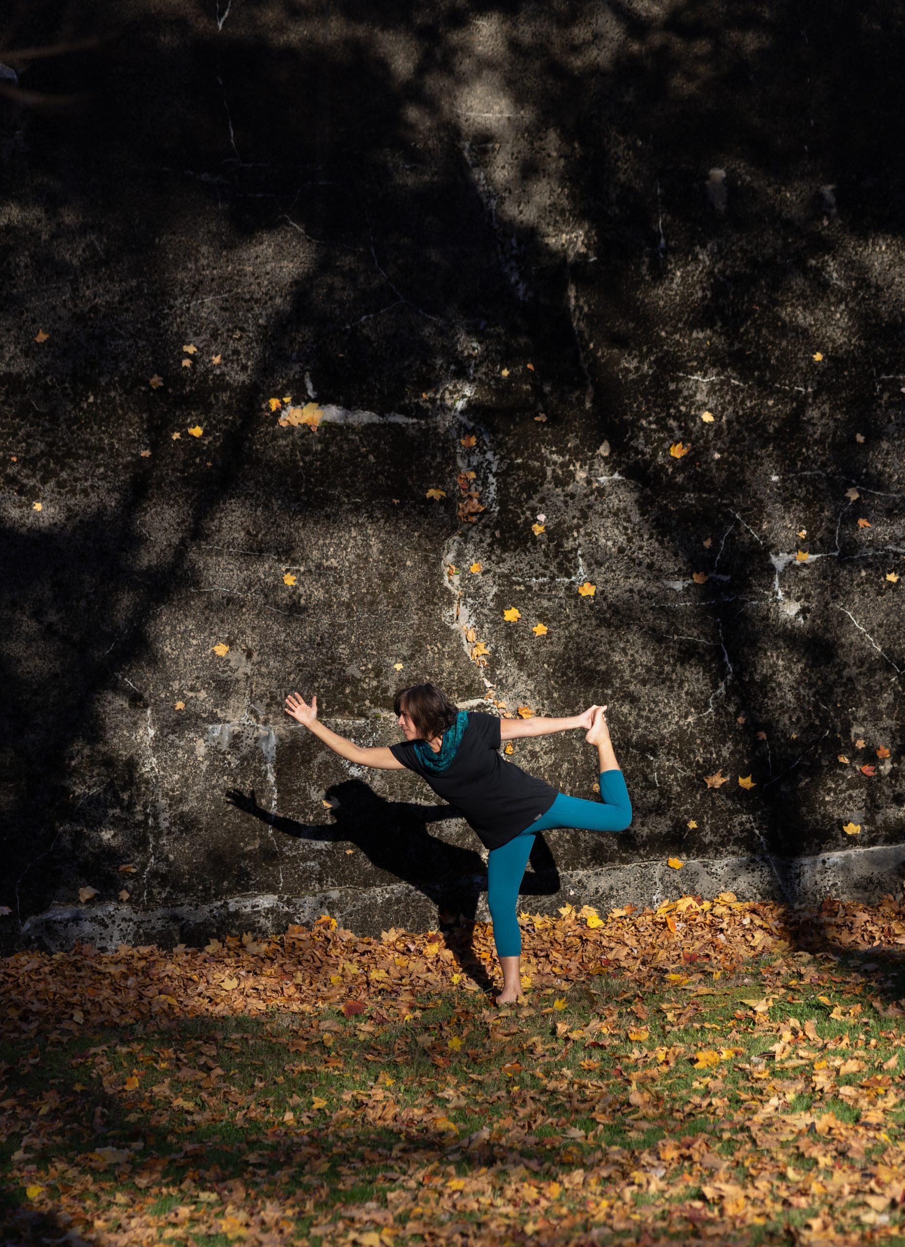 Tiffany Chan practicing yoga outdoors